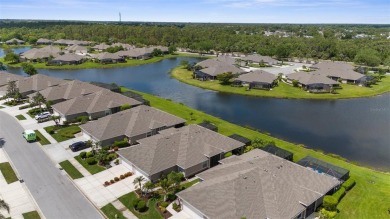 Welcome to Your Dream LAKEFRONT Villa - Maintenance-Free Living on Sabal Trace Golf and Country Club in Florida - for sale on GolfHomes.com, golf home, golf lot