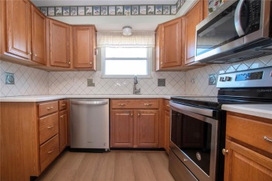 One or more photo(s) has been virtually staged. Nicely updated on North Lakes Golf Course in Florida - for sale on GolfHomes.com, golf home, golf lot