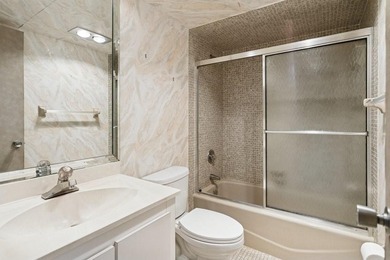 REDUCED! Located on prestigious Oaks Clubhouse Drive in Palm on Palm-Aire Country Club and Resort - Palms in Florida - for sale on GolfHomes.com, golf home, golf lot