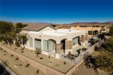 Discover luxury living in Lake Havasu City's premier gated on The Refuge Golf and Country Club in Arizona - for sale on GolfHomes.com, golf home, golf lot