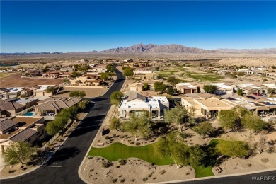 Discover luxury living in Lake Havasu City's premier gated on The Refuge Golf and Country Club in Arizona - for sale on GolfHomes.com, golf home, golf lot