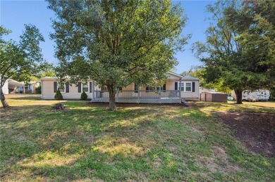 Spacious, clean and move-in ready! Freshly painted, new kitchen on Linn Valley Lakes - Deer Trace Golf Course in Kansas - for sale on GolfHomes.com, golf home, golf lot