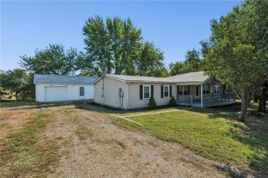 Spacious, clean and move-in ready! Freshly painted, new kitchen on Linn Valley Lakes - Deer Trace Golf Course in Kansas - for sale on GolfHomes.com, golf home, golf lot