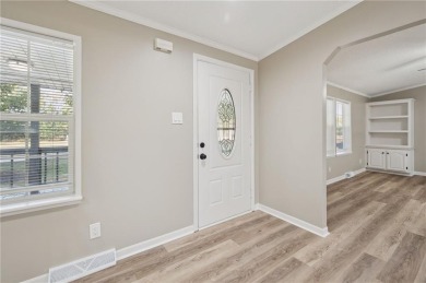 Spacious, clean and move-in ready! Freshly painted, new kitchen on Linn Valley Lakes - Deer Trace Golf Course in Kansas - for sale on GolfHomes.com, golf home, golf lot