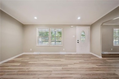 Spacious, clean and move-in ready! Freshly painted, new kitchen on Linn Valley Lakes - Deer Trace Golf Course in Kansas - for sale on GolfHomes.com, golf home, golf lot