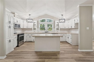 Spacious, clean and move-in ready! Freshly painted, new kitchen on Linn Valley Lakes - Deer Trace Golf Course in Kansas - for sale on GolfHomes.com, golf home, golf lot