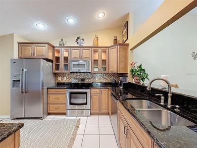 Welcome to this exquisite home located in the scenic Lake on The Links of Lake Bernadette in Florida - for sale on GolfHomes.com, golf home, golf lot