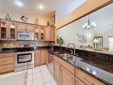 Welcome to this exquisite home located in the scenic Lake on The Links of Lake Bernadette in Florida - for sale on GolfHomes.com, golf home, golf lot