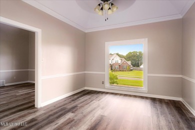 Step inside this beautifully built home with a grand on Cherokee Valley Golf Course in Mississippi - for sale on GolfHomes.com, golf home, golf lot