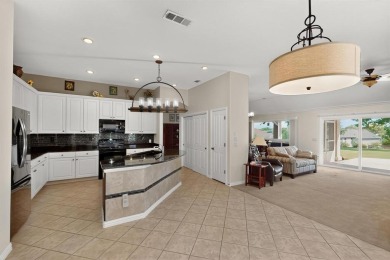 Charming 3-bedroom Trova with extended golf cart garage and on Wildhorse Golf Club of Robson Ranch in Texas - for sale on GolfHomes.com, golf home, golf lot