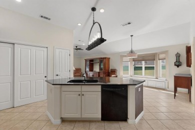 Charming 3-bedroom Trova with extended golf cart garage and on Wildhorse Golf Club of Robson Ranch in Texas - for sale on GolfHomes.com, golf home, golf lot