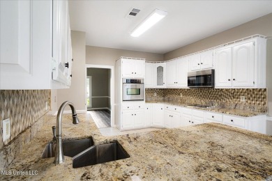 Step inside this beautifully built home with a grand on Cherokee Valley Golf Course in Mississippi - for sale on GolfHomes.com, golf home, golf lot