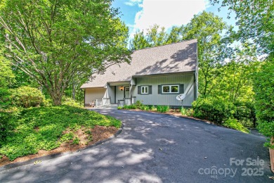 On the 12th hole of the acclaimed Connestee Falls golf course on Connestee Falls Golf Club in North Carolina - for sale on GolfHomes.com, golf home, golf lot