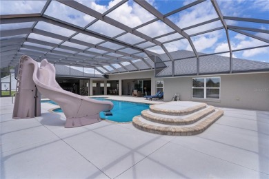 STUNNING GOLF FRONT OASIS WITH RESORT-STYLE OUTDOOR LIVING on Miona Lake Golf Club in Florida - for sale on GolfHomes.com, golf home, golf lot