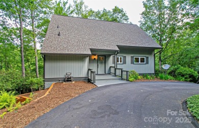 On the 12th hole of the acclaimed Connestee Falls golf course on Connestee Falls Golf Club in North Carolina - for sale on GolfHomes.com, golf home, golf lot