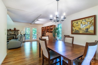 On the 12th hole of the acclaimed Connestee Falls golf course on Connestee Falls Golf Club in North Carolina - for sale on GolfHomes.com, golf home, golf lot