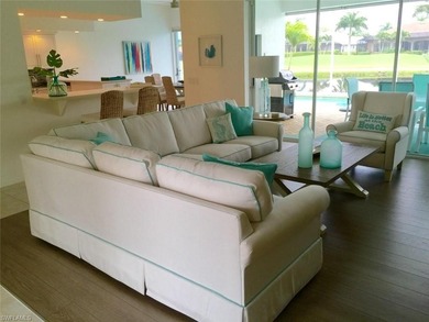 Experience serene lakeside and golf course living in this on Spanish Wells Golf and Country Club in Florida - for sale on GolfHomes.com, golf home, golf lot