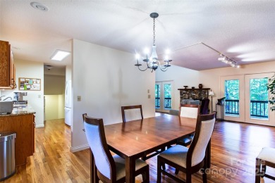On the 12th hole of the acclaimed Connestee Falls golf course on Connestee Falls Golf Club in North Carolina - for sale on GolfHomes.com, golf home, golf lot