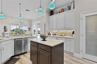 STUNNING GOLF FRONT OASIS WITH RESORT-STYLE OUTDOOR LIVING on Miona Lake Golf Club in Florida - for sale on GolfHomes.com, golf home, golf lot