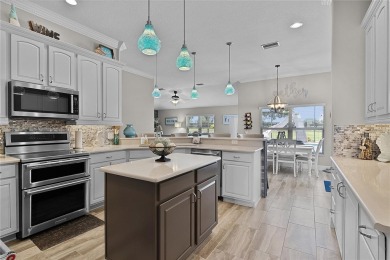STUNNING GOLF FRONT OASIS WITH RESORT-STYLE OUTDOOR LIVING on Miona Lake Golf Club in Florida - for sale on GolfHomes.com, golf home, golf lot