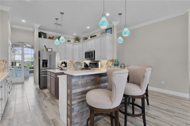 STUNNING GOLF FRONT OASIS WITH RESORT-STYLE OUTDOOR LIVING on Miona Lake Golf Club in Florida - for sale on GolfHomes.com, golf home, golf lot