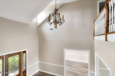 Step inside this beautifully built home with a grand on Cherokee Valley Golf Course in Mississippi - for sale on GolfHomes.com, golf home, golf lot