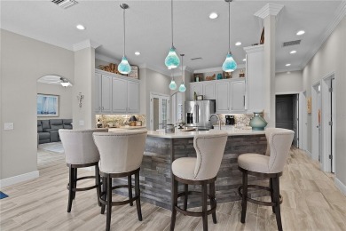 STUNNING GOLF FRONT OASIS WITH RESORT-STYLE OUTDOOR LIVING on Miona Lake Golf Club in Florida - for sale on GolfHomes.com, golf home, golf lot