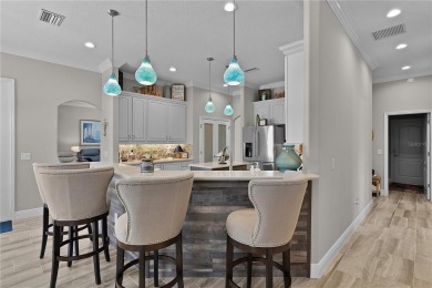 STUNNING GOLF FRONT OASIS WITH RESORT-STYLE OUTDOOR LIVING on Miona Lake Golf Club in Florida - for sale on GolfHomes.com, golf home, golf lot