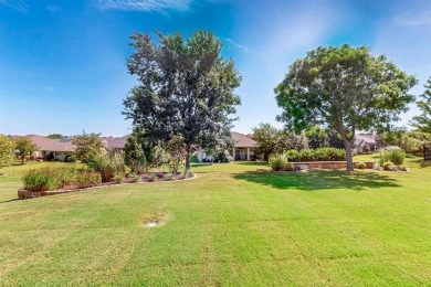 Charming 3-bedroom Trova with extended golf cart garage and on Wildhorse Golf Club of Robson Ranch in Texas - for sale on GolfHomes.com, golf home, golf lot