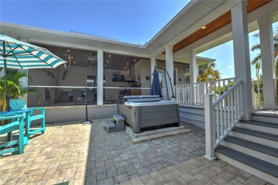 GRACEFUL ON WEST GRACE STREET, this custom designed 2016 Key on Twin Isles Country Club in Florida - for sale on GolfHomes.com, golf home, golf lot