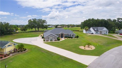 STUNNING GOLF FRONT OASIS WITH RESORT-STYLE OUTDOOR LIVING on Miona Lake Golf Club in Florida - for sale on GolfHomes.com, golf home, golf lot