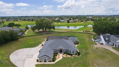 STUNNING GOLF FRONT OASIS WITH RESORT-STYLE OUTDOOR LIVING on Miona Lake Golf Club in Florida - for sale on GolfHomes.com, golf home, golf lot