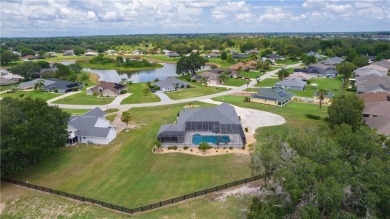STUNNING GOLF FRONT OASIS WITH RESORT-STYLE OUTDOOR LIVING on Miona Lake Golf Club in Florida - for sale on GolfHomes.com, golf home, golf lot