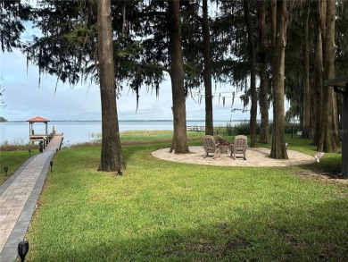 WATERFRONT HOME ON LAKE HARRIS!!!!!   Bring your boat, savor on Bay Tree Golf Course in Florida - for sale on GolfHomes.com, golf home, golf lot