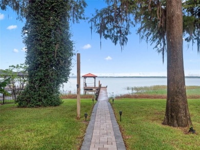 WATERFRONT HOME ON LAKE HARRIS!!!!!   Bring your boat, savor on Bay Tree Golf Course in Florida - for sale on GolfHomes.com, golf home, golf lot