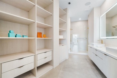 Live in one of the most serene areas of South Beach, directly on Miami Beach Golf Club in Florida - for sale on GolfHomes.com, golf home, golf lot
