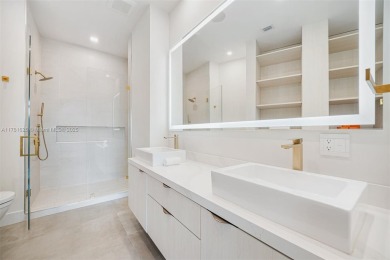 Live in one of the most serene areas of South Beach, directly on Miami Beach Golf Club in Florida - for sale on GolfHomes.com, golf home, golf lot