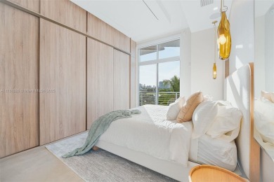 Live in one of the most serene areas of South Beach, directly on Miami Beach Golf Club in Florida - for sale on GolfHomes.com, golf home, golf lot