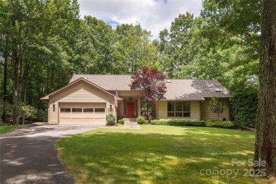 Discover your dream home nestled off of the picturesque 14th on Connestee Falls Golf Club in North Carolina - for sale on GolfHomes.com, golf home, golf lot
