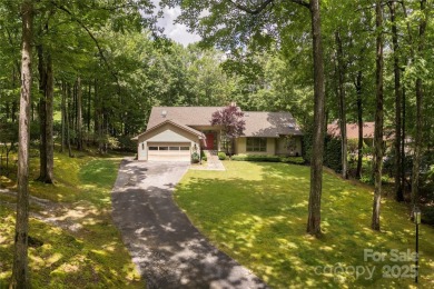 Discover your dream home nestled off of the picturesque 14th on Connestee Falls Golf Club in North Carolina - for sale on GolfHomes.com, golf home, golf lot