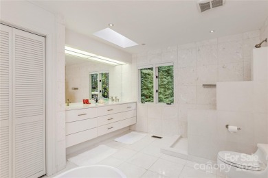 Discover your dream home nestled off of the picturesque 14th on Connestee Falls Golf Club in North Carolina - for sale on GolfHomes.com, golf home, golf lot