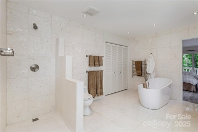Discover your dream home nestled off of the picturesque 14th on Connestee Falls Golf Club in North Carolina - for sale on GolfHomes.com, golf home, golf lot
