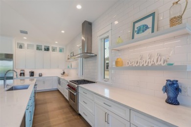 Welcome to your dream coastal retreat on beautiful Anna Maria on Key Royale Club in Florida - for sale on GolfHomes.com, golf home, golf lot