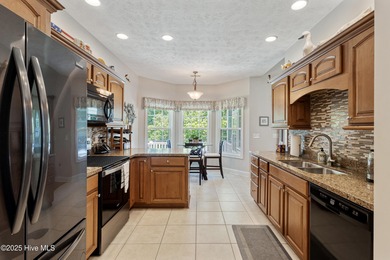 EXCEPTIONAL IS THE WORD! This pristine home is tucked away on a on Carolina Shores Golf Course in North Carolina - for sale on GolfHomes.com, golf home, golf lot