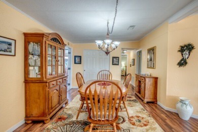 Welcome to this spacious three-bedroom, three-bath home in the on Lake Fairways Country Club in Florida - for sale on GolfHomes.com, golf home, golf lot