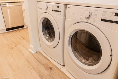 MINUTES TO THE BEACH!  This elegantly appointed condo, ideally on Imperial Golf Club in Florida - for sale on GolfHomes.com, golf home, golf lot