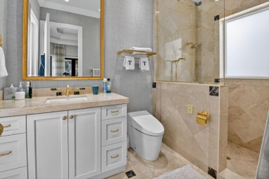 Renovated 3-bedroom + office home on an incredible lot in St on St. Andrews Country Club of Boca Raton in Florida - for sale on GolfHomes.com, golf home, golf lot