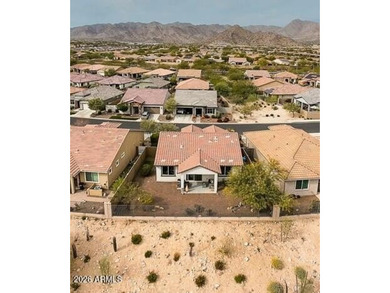 This welcoming bungalow offers low-maintenance desert on Verrado Golf Club - Victory in Arizona - for sale on GolfHomes.com, golf home, golf lot