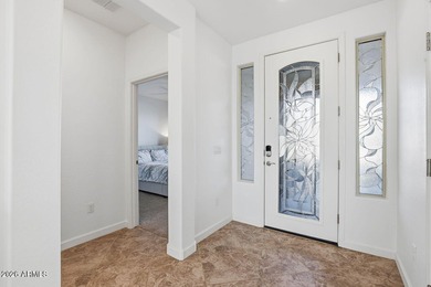 This welcoming bungalow offers low-maintenance desert on Verrado Golf Club - Victory in Arizona - for sale on GolfHomes.com, golf home, golf lot