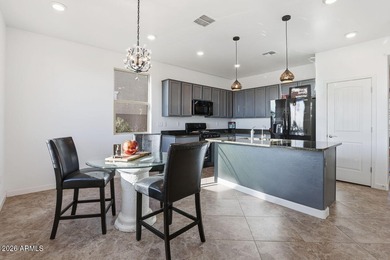 This welcoming bungalow offers low-maintenance desert on Verrado Golf Club - Victory in Arizona - for sale on GolfHomes.com, golf home, golf lot